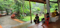 Mr. Nara waiting out the Rain