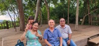 Neil with New Friends at Phnom Bakheng