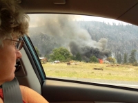 Structure busting into flames