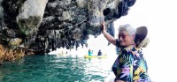 Nan Touching a Stalactite