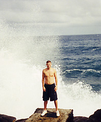 Marc in the spray of the Pacific Ocean