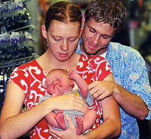 Vajra and Jason with baby Quentin