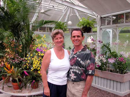 The happy couple in the Orchid House at the Lodge at Ko`ele