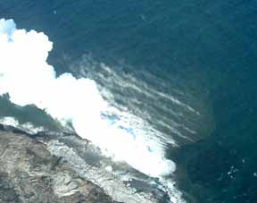 Lava pouring into the ocean