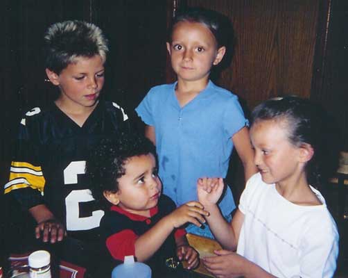 Keegan, Gillian, and Kalli with Jonathan at La Pizza House