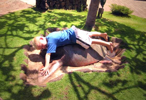 Quentin on the turtle sculpture