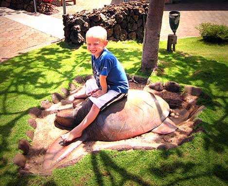 Quentin on the turtle sculpture