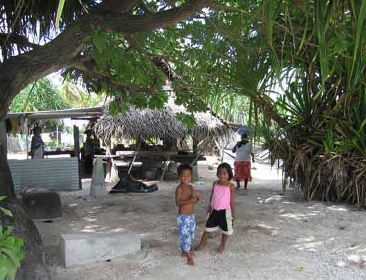 Kids in front of house