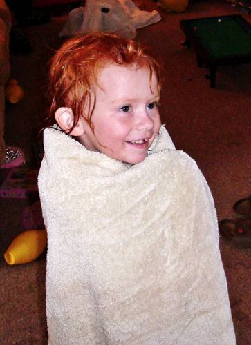 Sophie wrapped in a towel