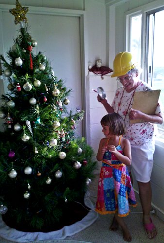 Jean inspecting the tree trimming job with our friend Joyah