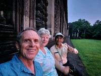 Sitting on the wall at Angkor Wat