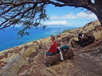 Nan resting under a tree