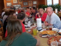 Kreichers enjoying pizza