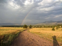 Rainbow with the thundercloud behind