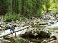 Neil on log at creek