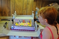 Sophie blowing out her candles