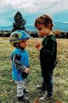 Patrick  and Connor with a Dandelion