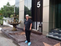 Nan in front of Dr. Sunil\'s Center