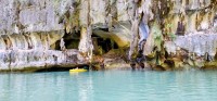 A Canoe Exiting Oyster Cave